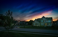 gray wooden house during sunset