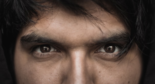 A close-up of expressive comic-style eyes filled with emotion and intensity.