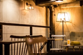 Cozy interior of Black Doves cafe with warm lighting and customers sipping coffee