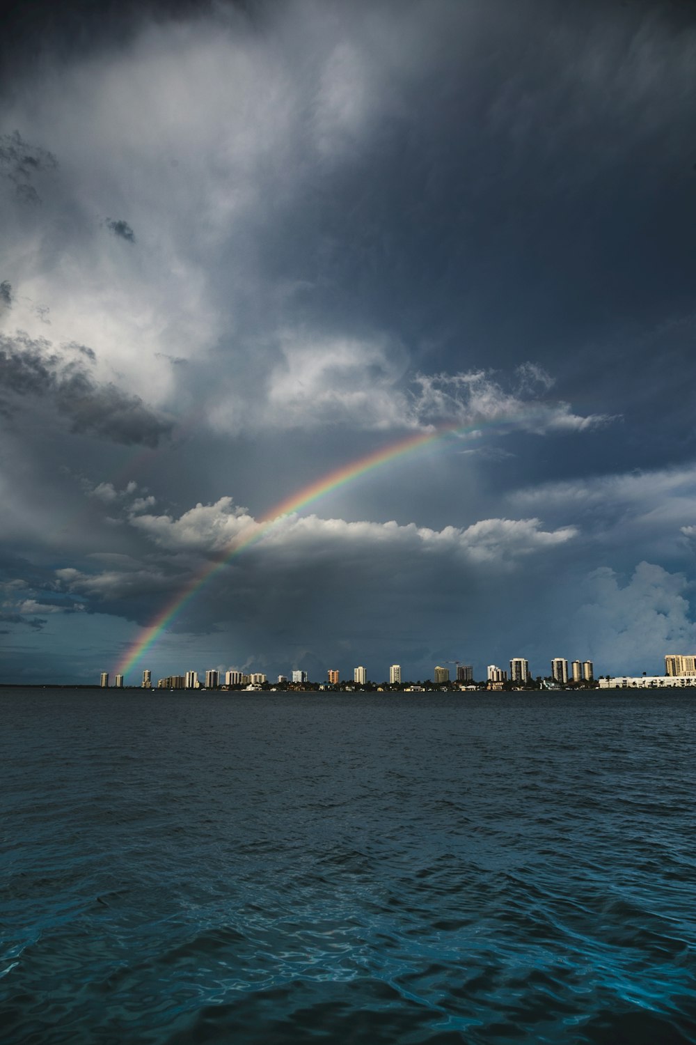 rainbow over cityscape during daytime