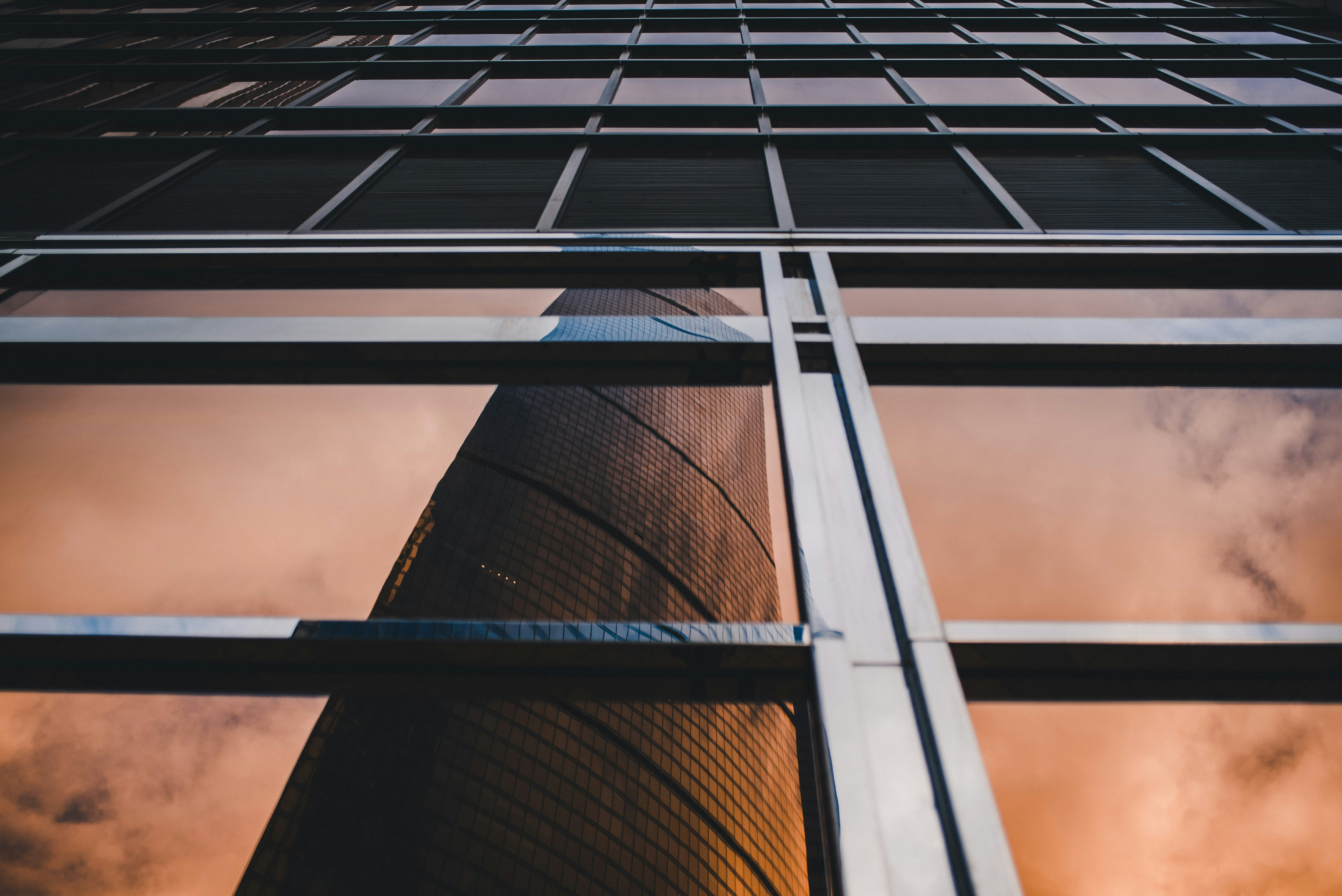 woman wearing yellow long-sleeved dress under white clouds and blue sky during daytime
