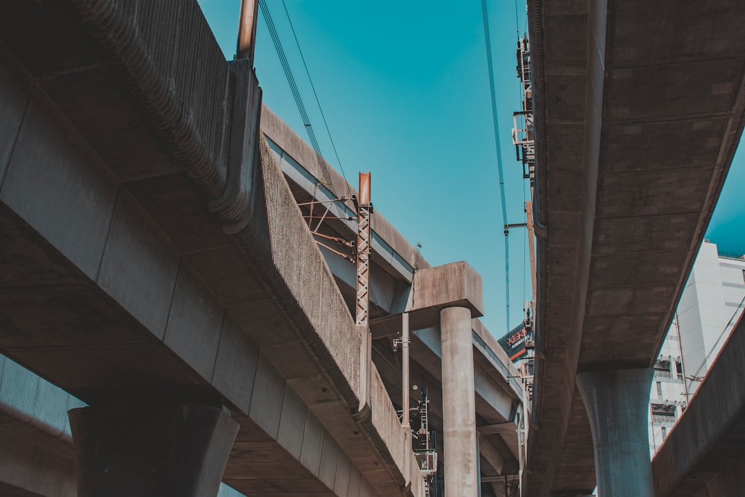 low-angle view of concrete bridge