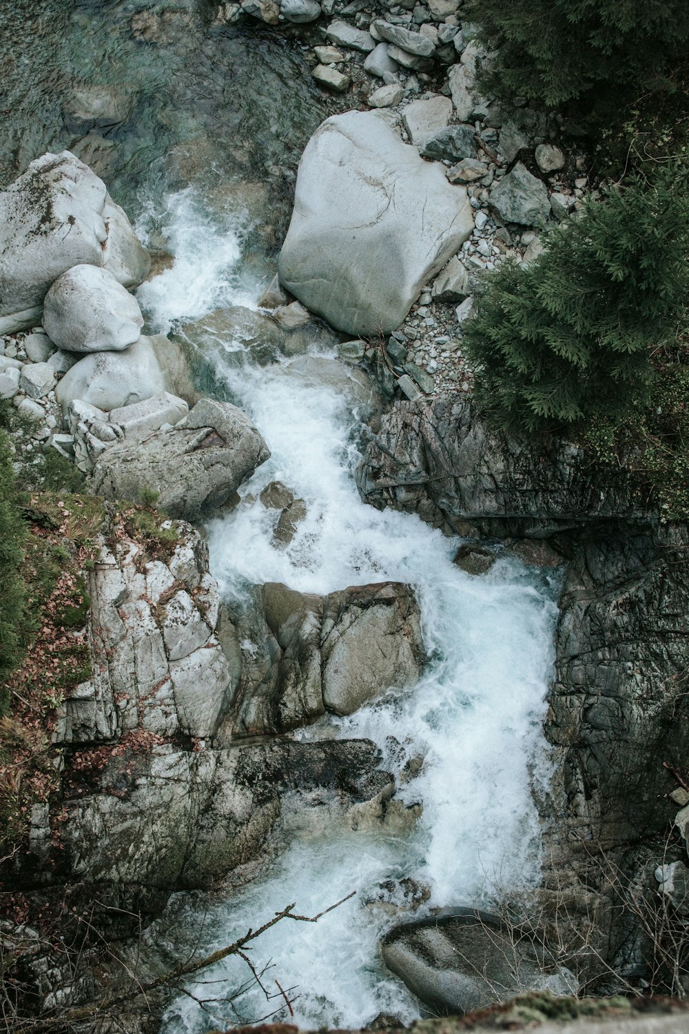 body of water in between rock formations