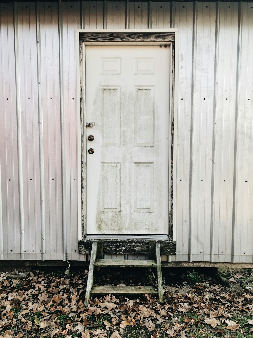 white wooden 6-panel door