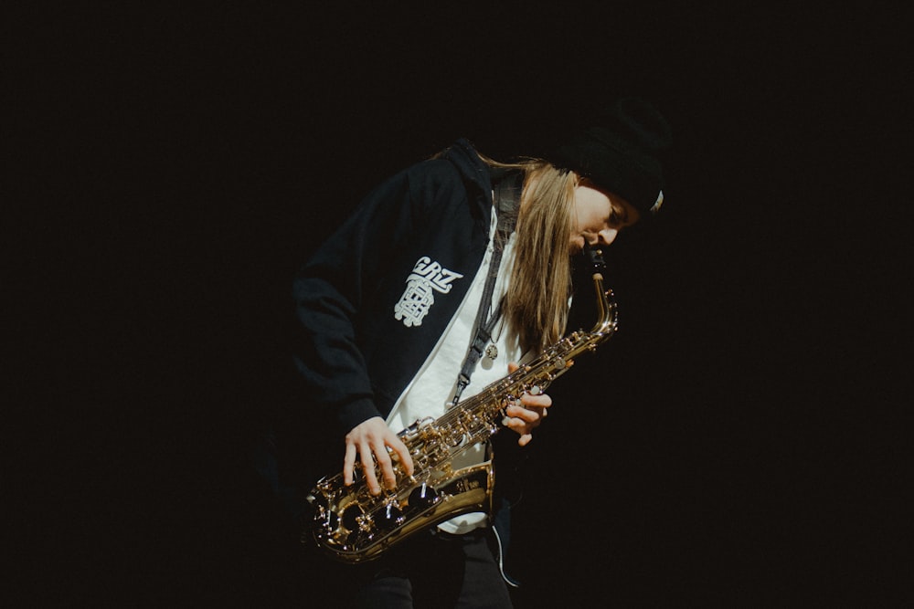 man playing saxophone