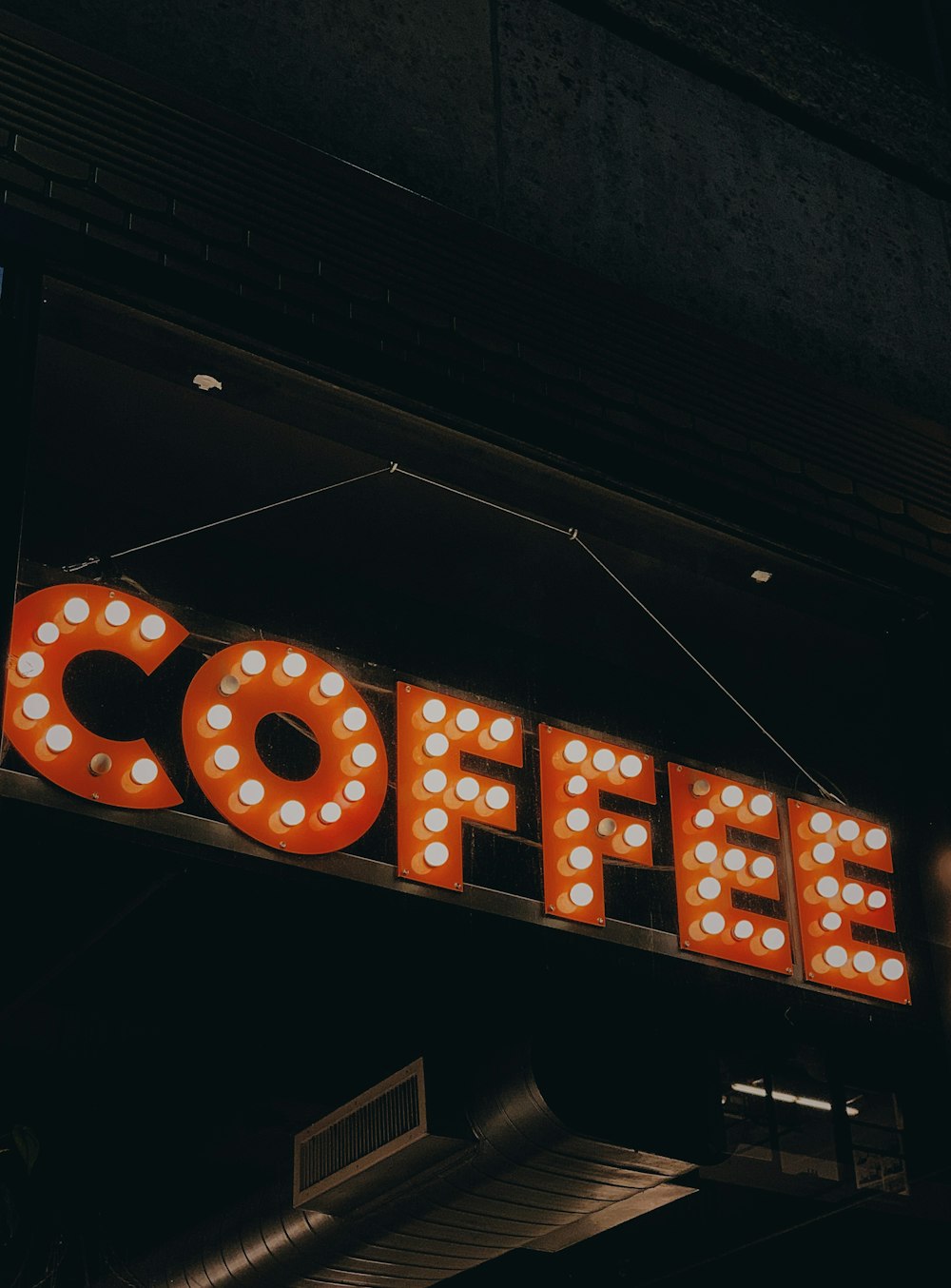 lighted coffee marquee at nighttime
