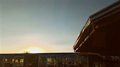 The sun setting over كلية الدلم with one of our shuttles ready to depart.