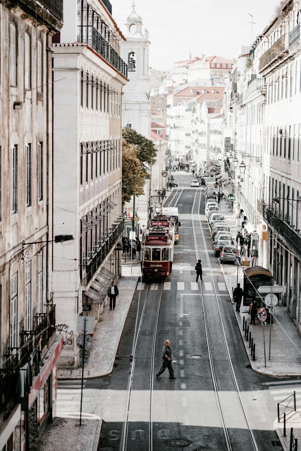 aerial photography of concrete buildings and walking people