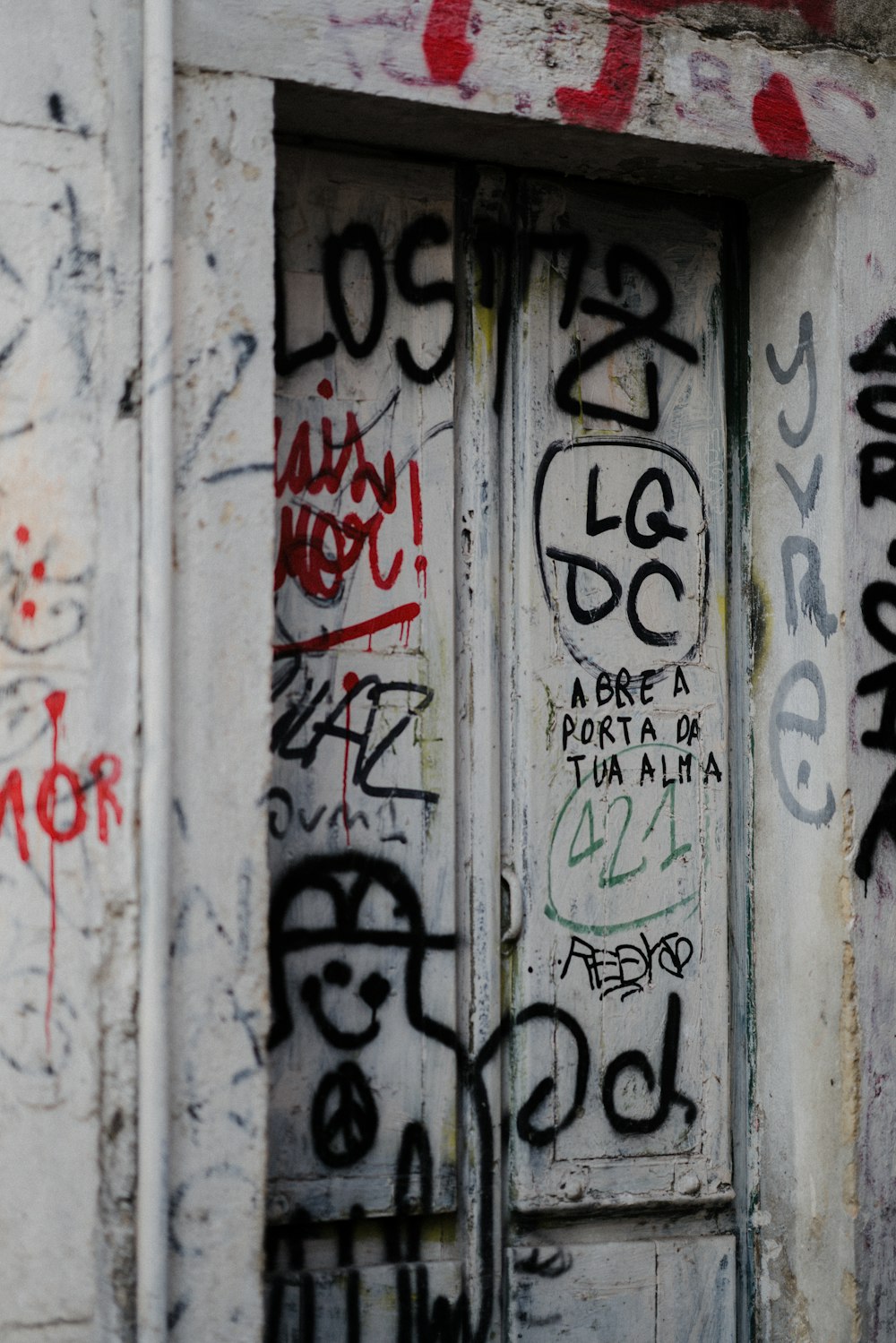 a door that has some graffiti on it