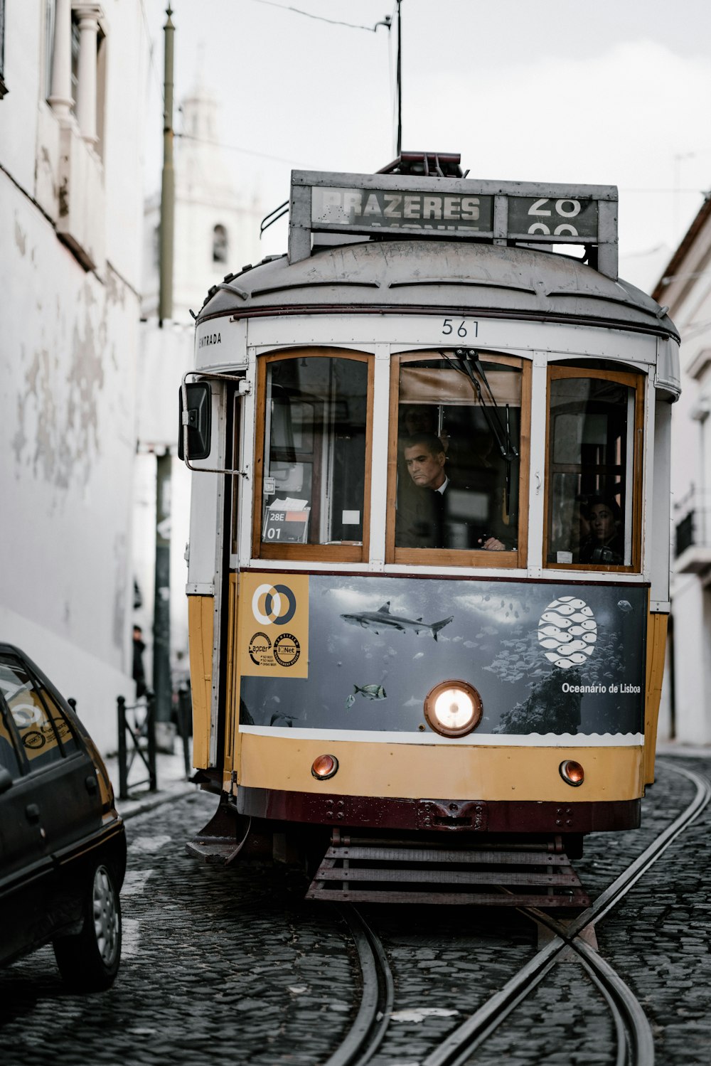 selective focus photography of man in tram