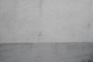 A freshly painted exterior wall with smooth finishing and subtle color gradients.