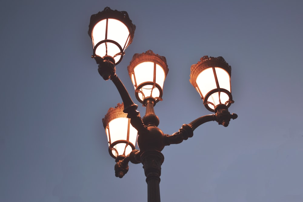 turned-on 4-light street light