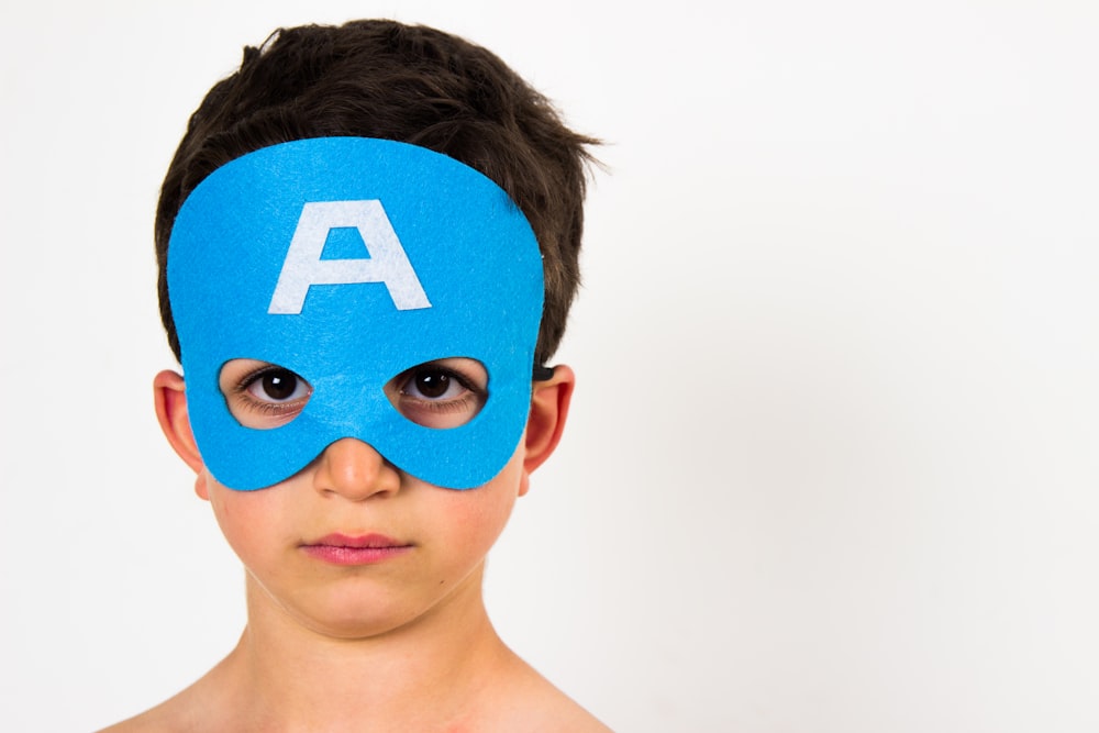 boy with blue mask