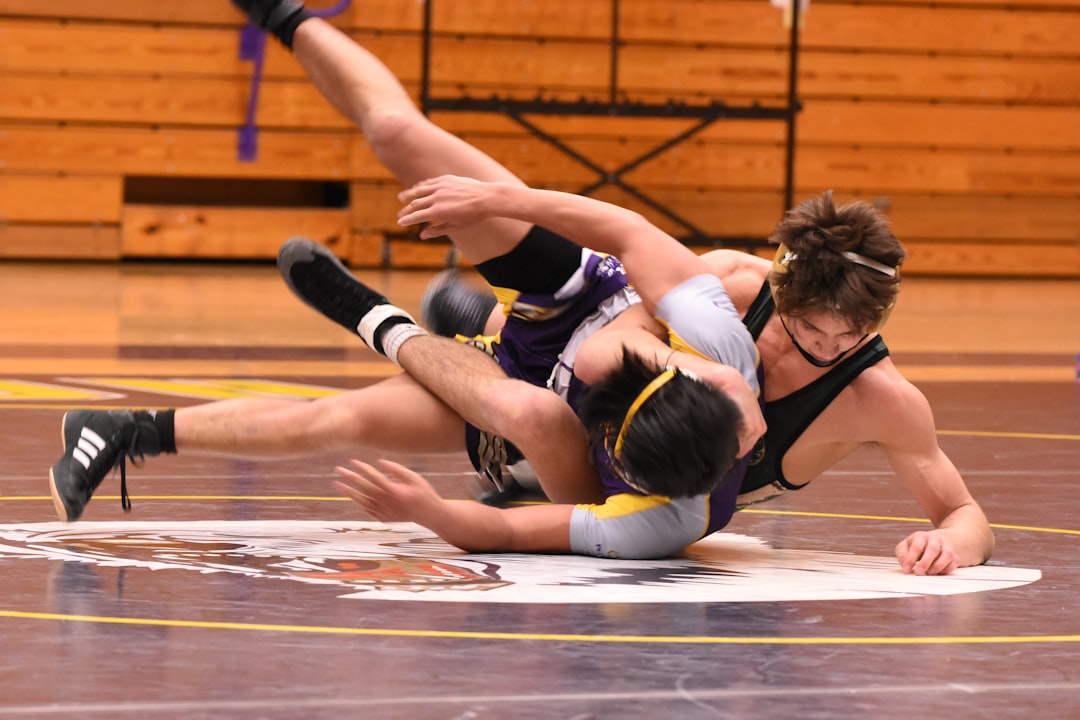two men diving on floor, Take down