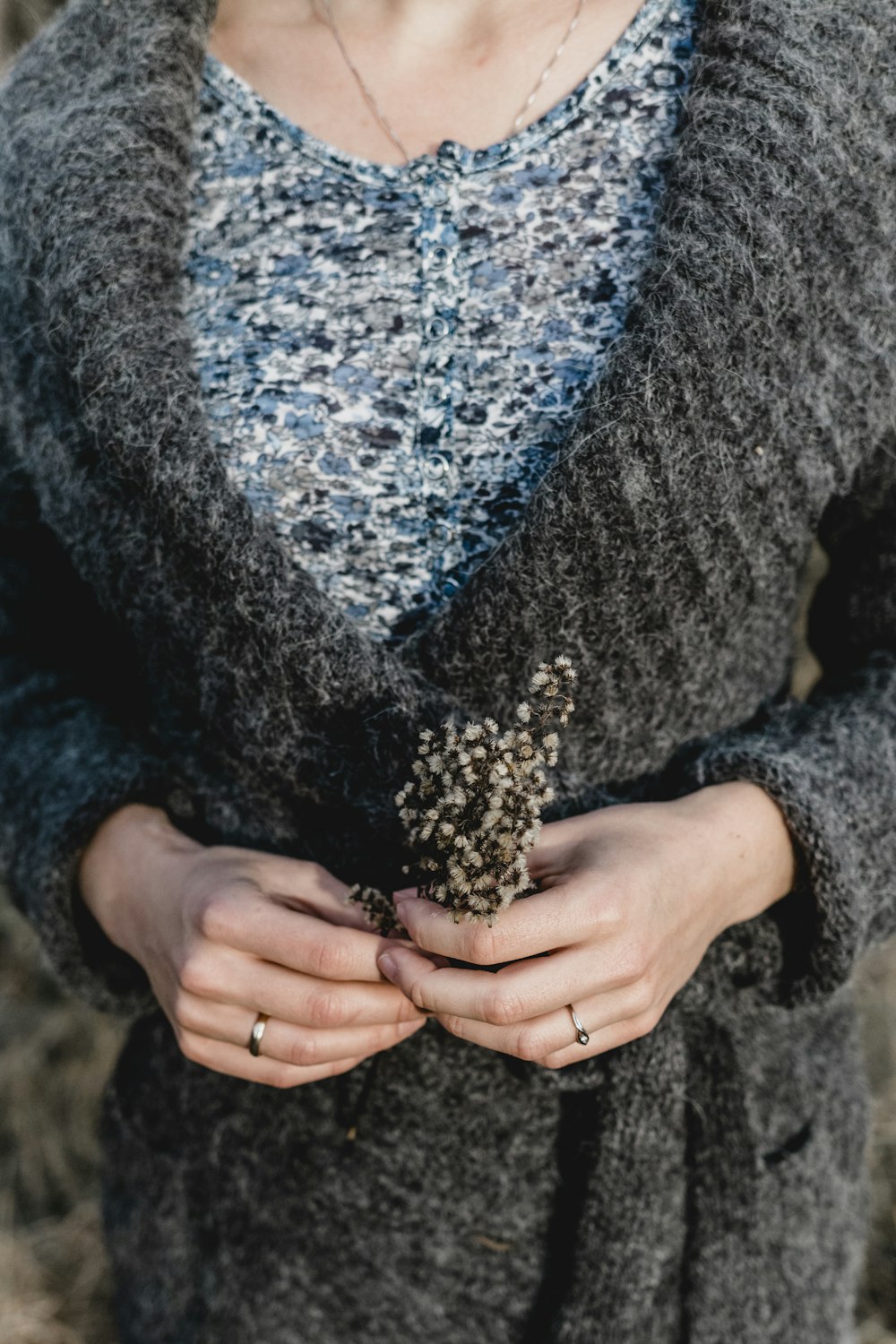 woman wearing gray coat