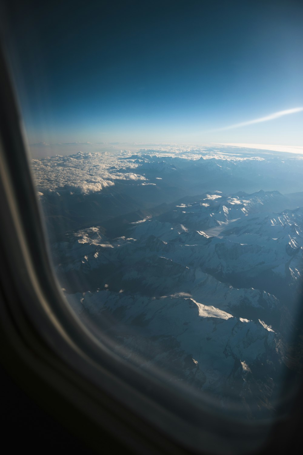 glass airplane window at daytime