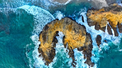 aerial view of cliff near ocean drone view google meet background