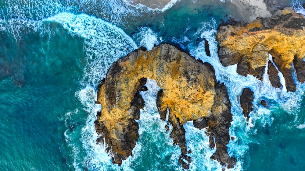 aerial view of cliff near ocean