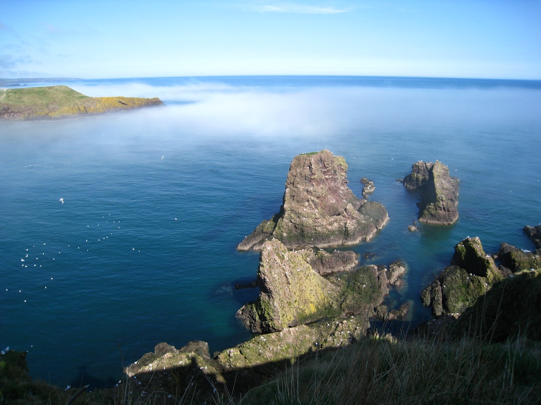 travelers stories about Cliff in Dunnottar Castle, United Kingdom