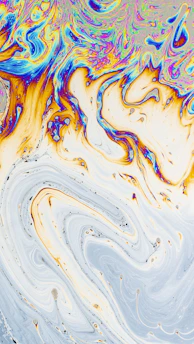 a close up of an abstract painting with colors