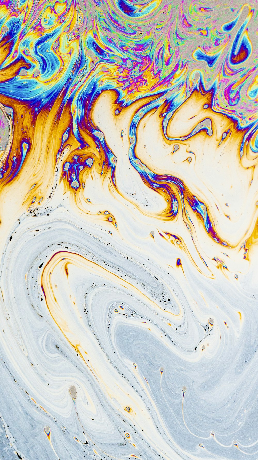 a close up of an abstract painting with colors