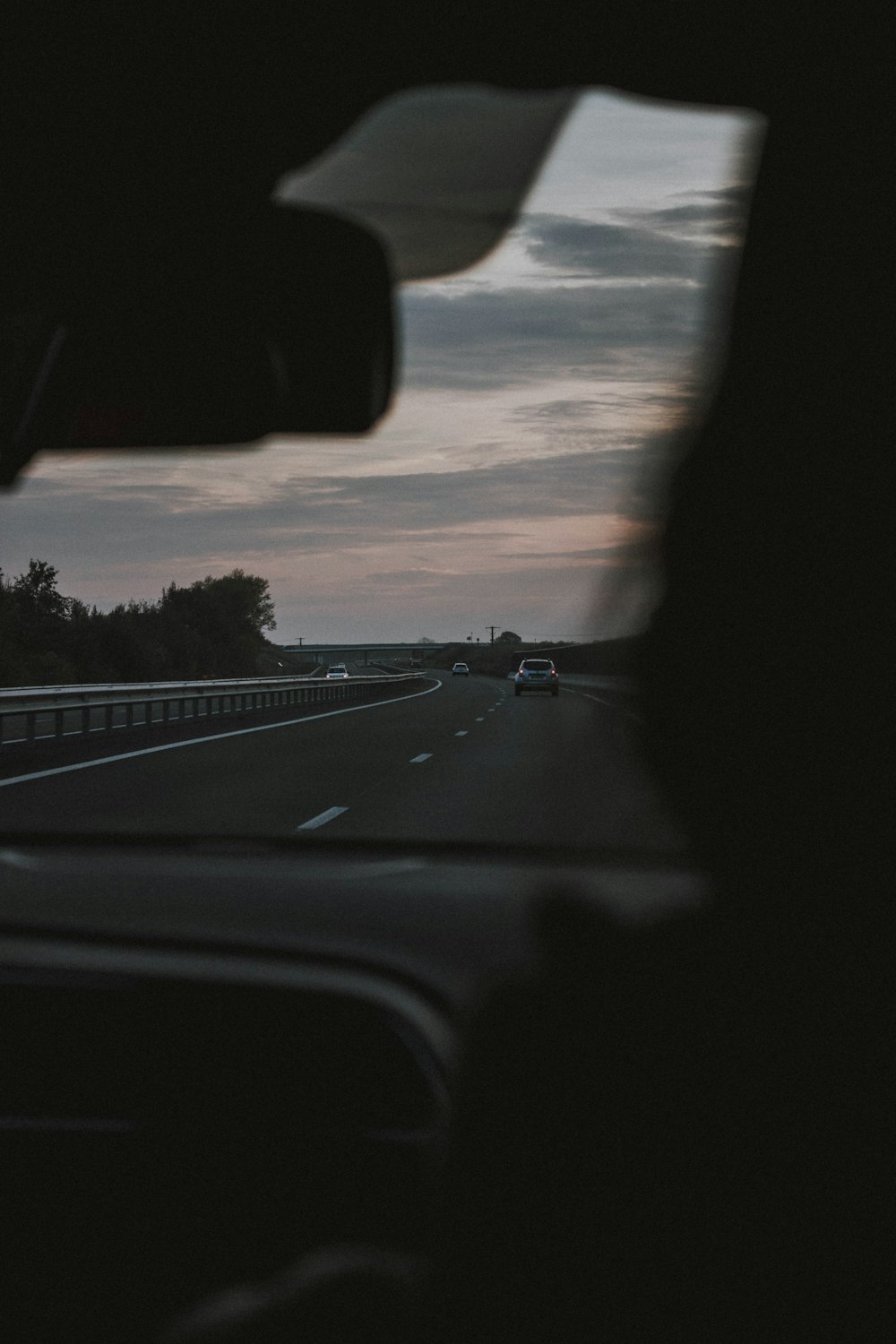 person driving vehicle during golden hour