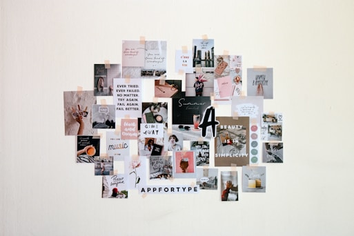 a collage of pictures and words on a white wall