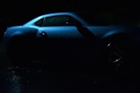 A sleek car covered in a glossy protective film.