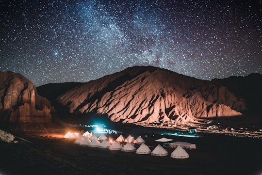 tents near mountain during night time in Atacama Desert Chile