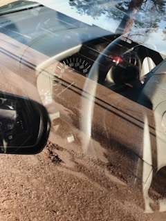 Car dashboard gleaming with our dash board polish, reflecting sunlight