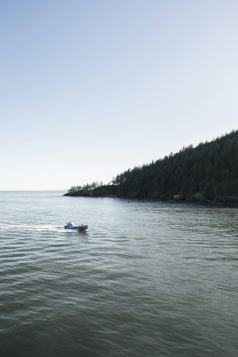 motorboat on calm body of water