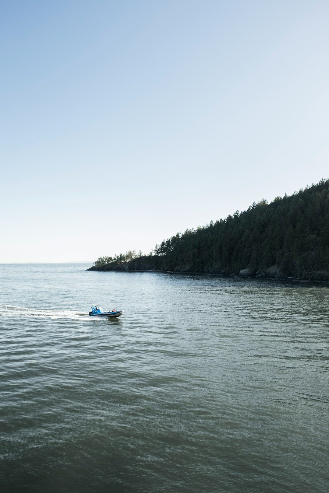 motorboat on calm body of water