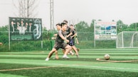 A dynamic shot of a youth football tournament showcasing teamwork.