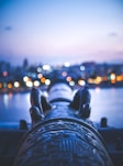 a view of a body of water with a city in the background