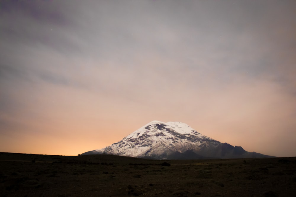 mountain coated with snow