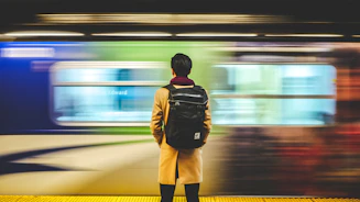 man wearing black backpack