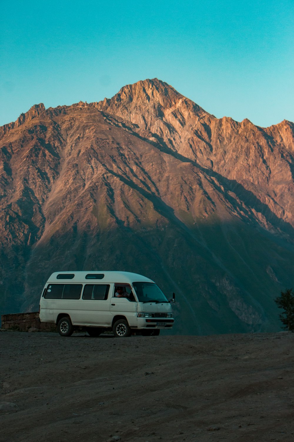 white van near mountain