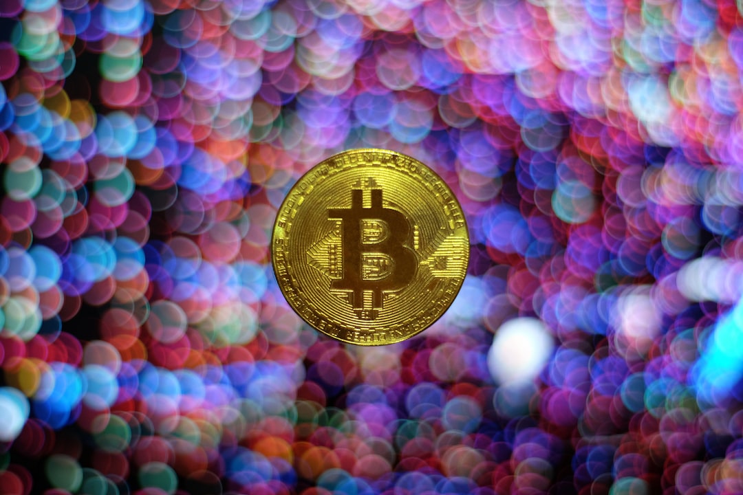 round gold-colored Bitcoin illustration