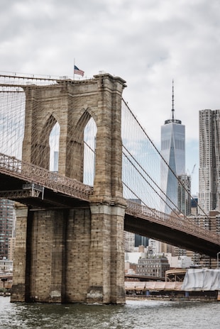 Brooklyn Bridge, New York under cloudy sky during daytime