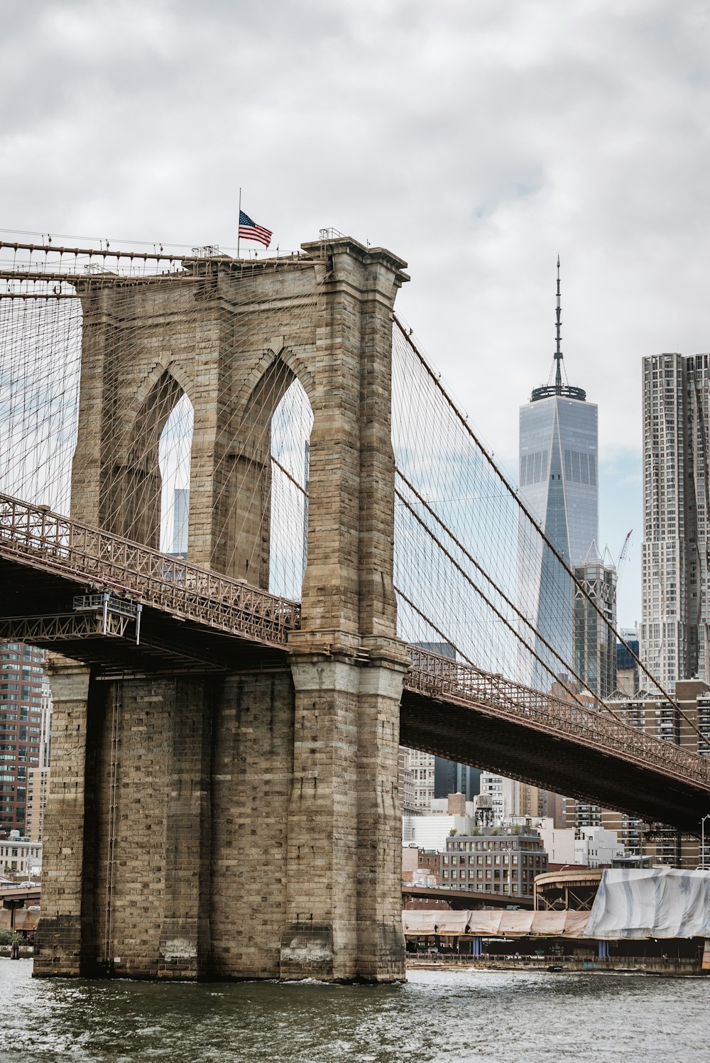 Brooklyn Bridge, New York under cloudy sky during daytime