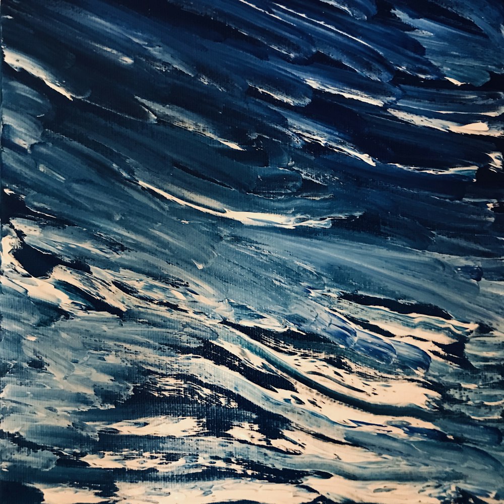 peinture abstraite bleu, blanc et noir