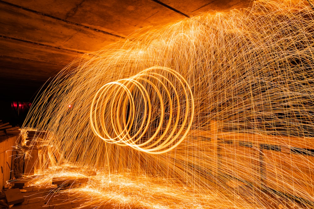 a long exposure photo of sparks in a tunnel