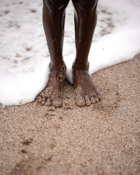 person standing on seashore
