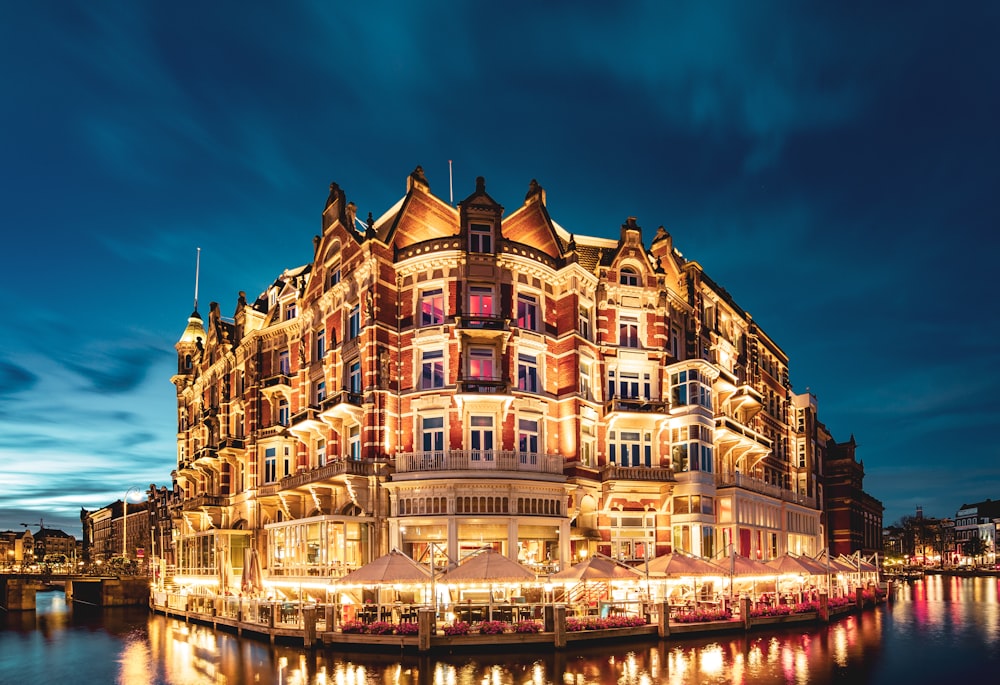 landmark photo of building beside body of water