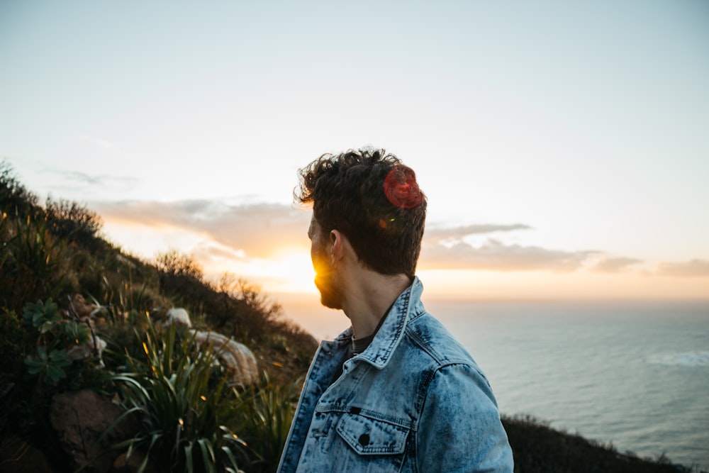 man in blue denim jacket