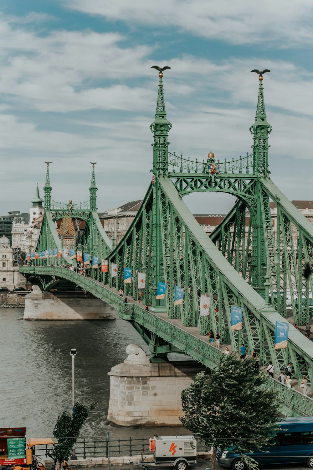 green metal bridge at daytime