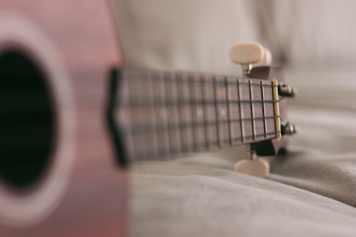 Close-up of a cavaquinho being played during a samba session.