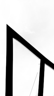 A sleek, modern website homepage with a black background and minimalist design.