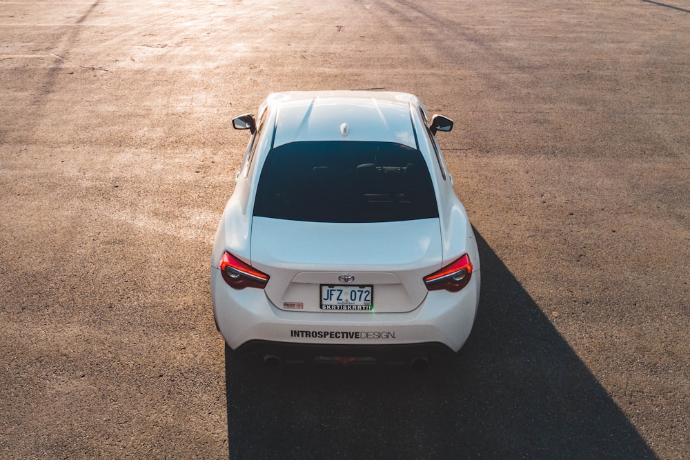 white vehicle on road during daytime