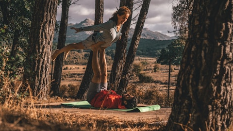 man lifting woman